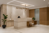 Luxury Reception Counter – Cream Marble Finish with Brass Detailing | SRK Modular Furniture Co.