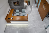 Corporate Reception Counter – Walnut Wood with LED Stripes & Grey Accent | SRK Modular Furniture Co.