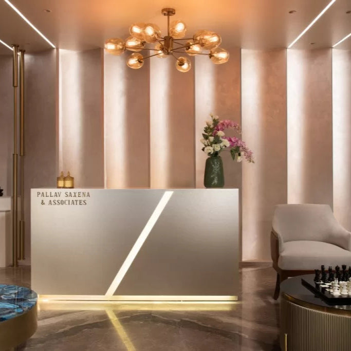 Premium Reception Counter – Champagne Gold with LED Base & Diagonal Accent | SRK Modular Furniture Co.