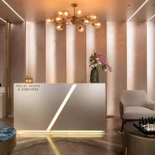 Premium Reception Counter – Champagne Gold with LED Base & Diagonal Accent | SRK Modular Furniture Co.