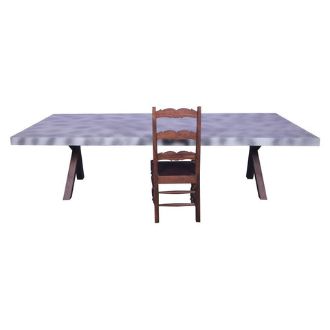Contemporary dining table with terazzo look metal legs in sagwan gray distress on top
